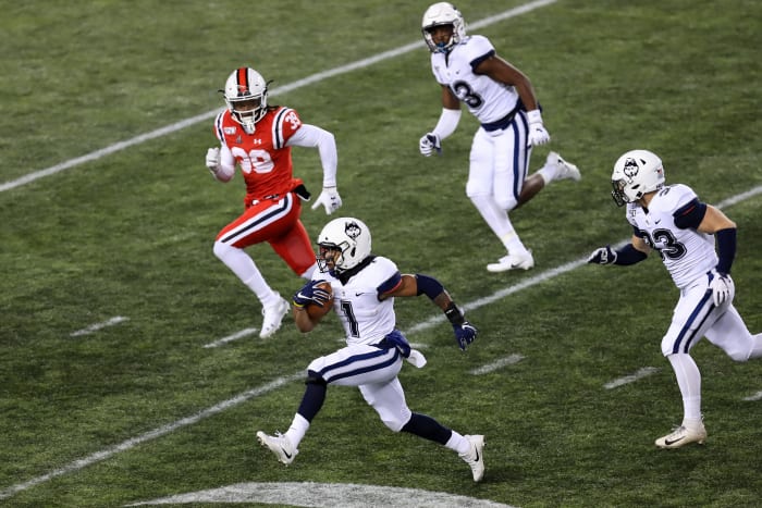 Nov 9, 2019; Cincinnati, OH, USA; Connecticut Huskies running back Art Thompkins (1) carries the ball on a kick return against the Cincinnati Bearcats in the second half at Nippert Stadium. Mandatory Credit: Aaron Doster-USA TODAY Sports